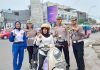 Honda Banten Bagikan Helm Gratis Bareng Polisi untuk Pengendara Bandel